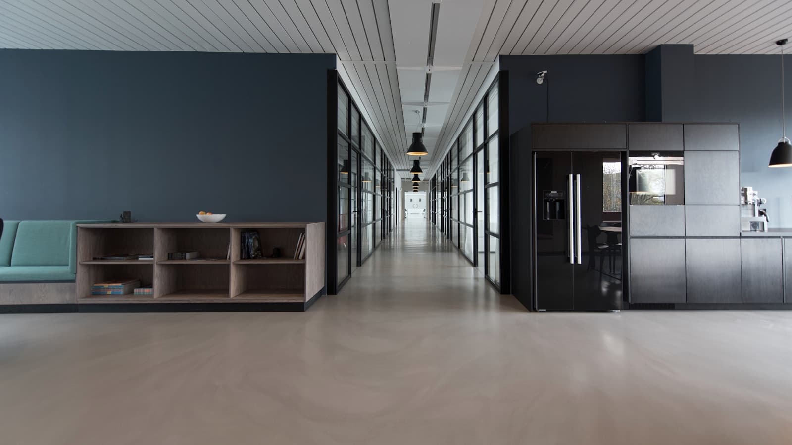 Wide view of a modern open office, the white-collar workspace AI automation is now reshaping